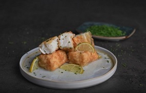 Un plato con comidaDescripción generada automáticamente